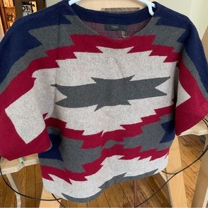 Southwest print cropped shirt sleeve sweater.